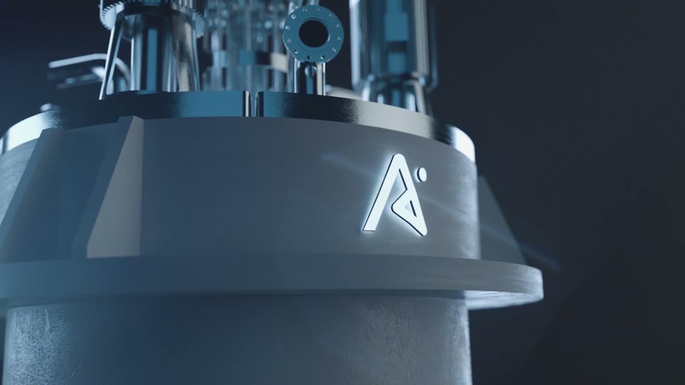 A 3D render of a reactor assembly, lit against a dark background.